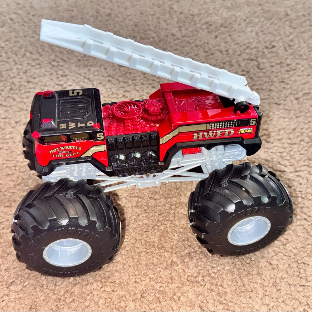 Hot Wheels Red Monster Fire Rescue Truck with White Ladder - Picture 2 of 3